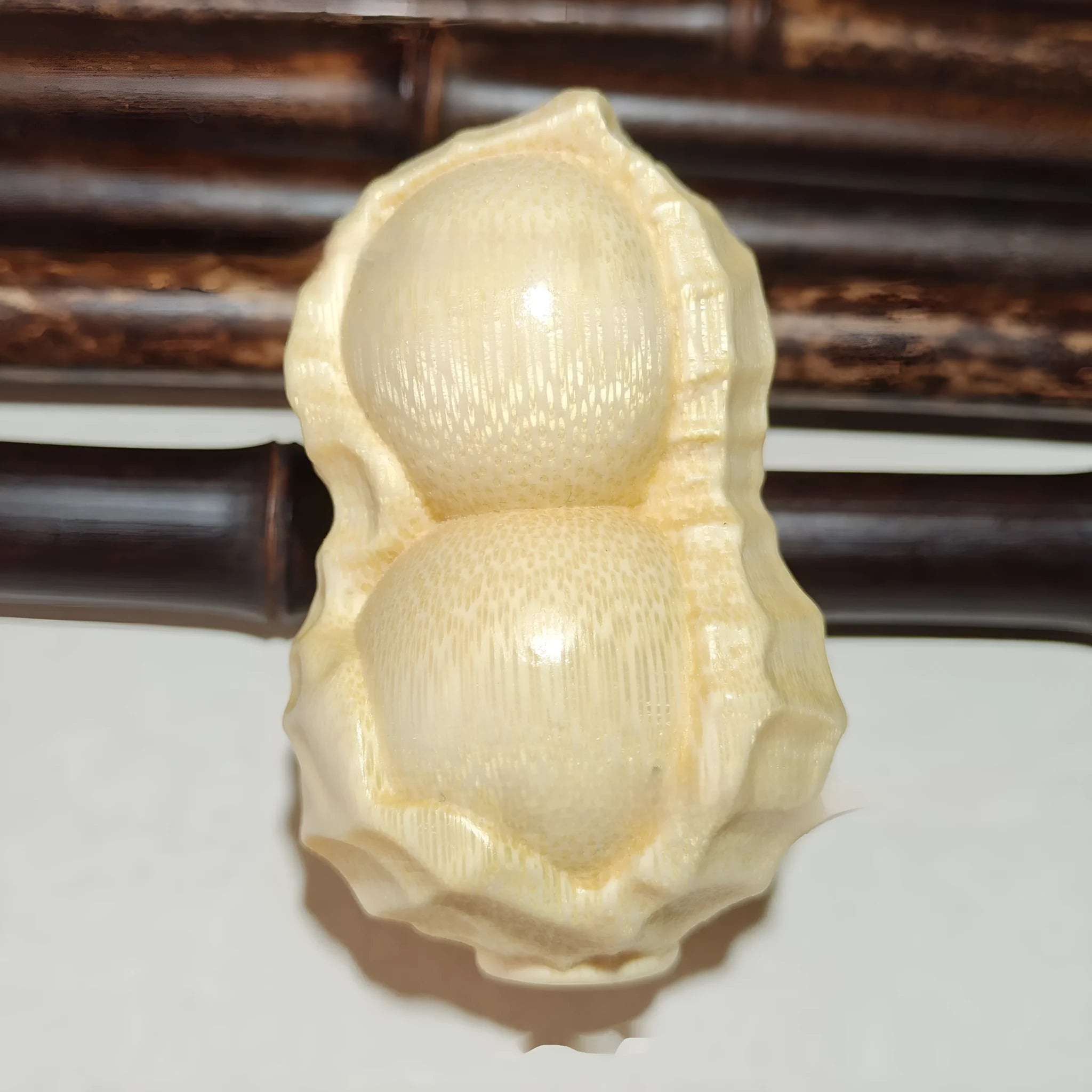 Natural bamboo peanut carving ornament with modern simple design