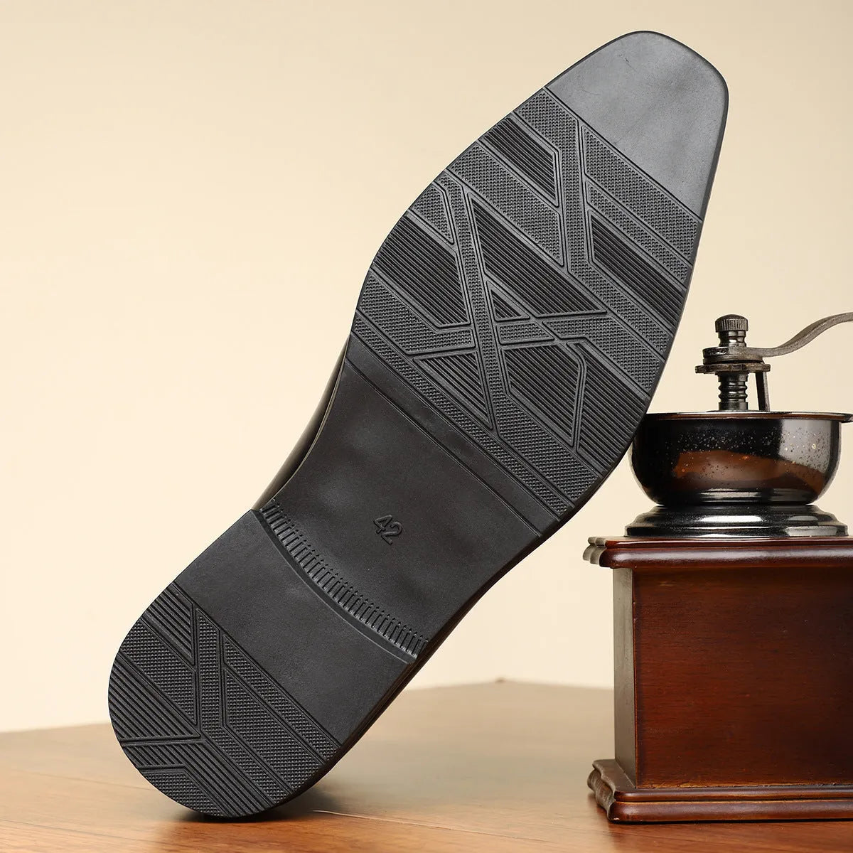 Brown retro men's formal shoe with side zipper, embossed texture, square toe, and low square heel on a plain background.