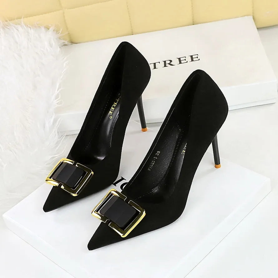 Black suede women's high heel shoes with a pointed toe and a 9cm stiletto heel.