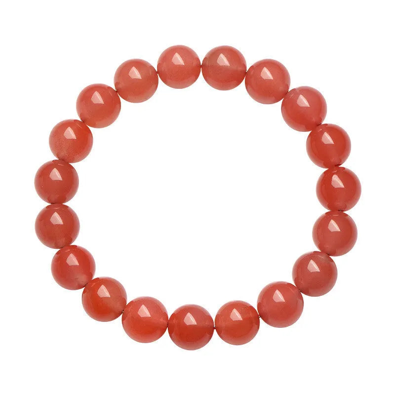 Natural cherry red agate beaded bracelet shown in a single loop, with polished round stones.