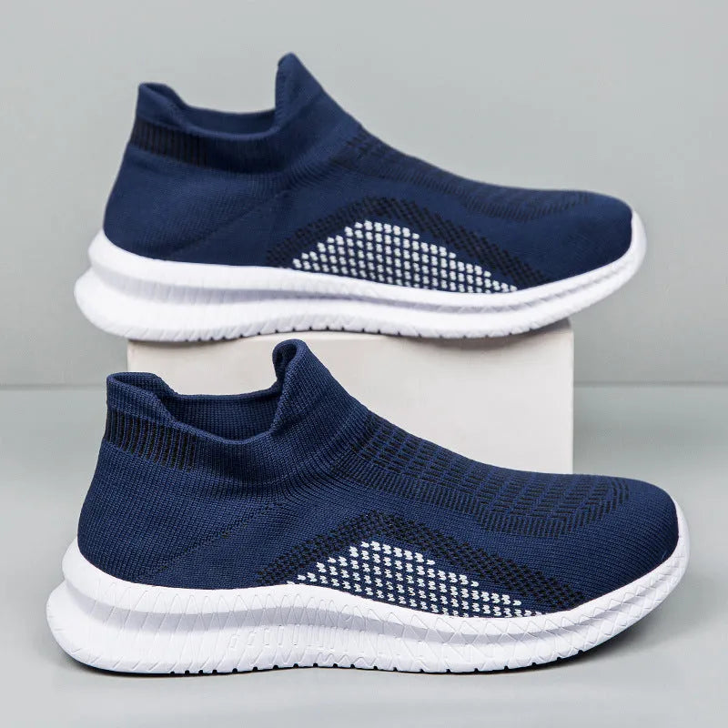 Popcorn Flyknit low-top fabric casual sneaker in solid black, blue, or white with a round toe.