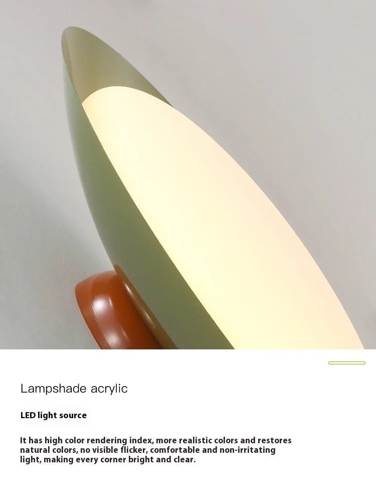 Modern cream style flying saucer shaped ceiling lamp in an iron shade.