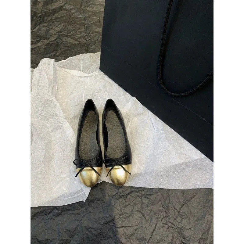 Women's ballet flat shoes with round toe and bowknot detail in soft rubber sole construction