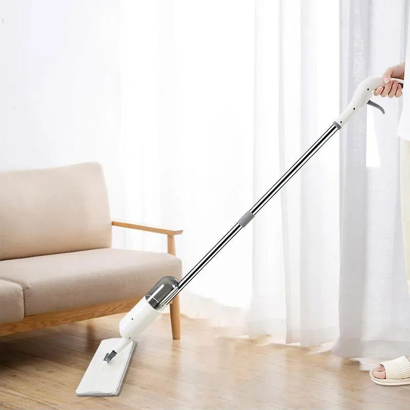Flat squeeze mop with bucket wringing system showing 360-degree rotation and stainless steel construction