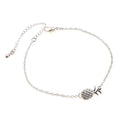 Women's alloy pineapple charm bracelet in gold or silver finish from XINGX series.