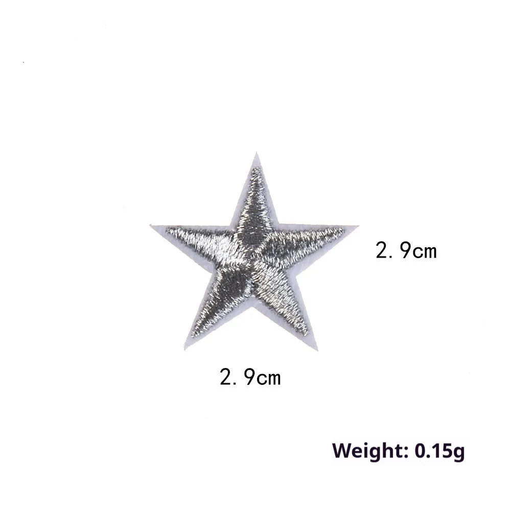 Colourful five-pointed star cloth embroidery stickers for DIY clothing decoration on a fabric background.