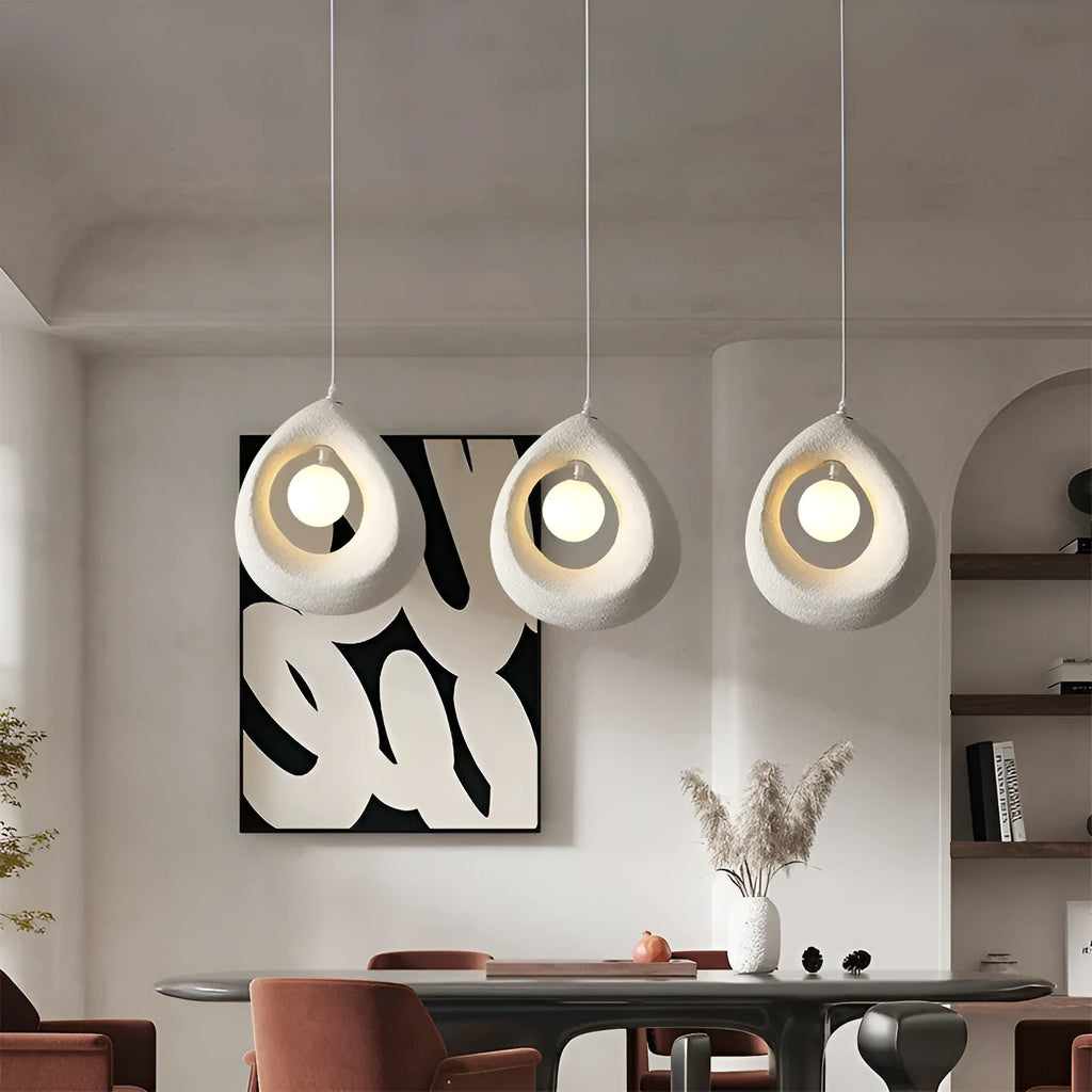 Retro modern chandelier with milky white shade hanging as pendant light