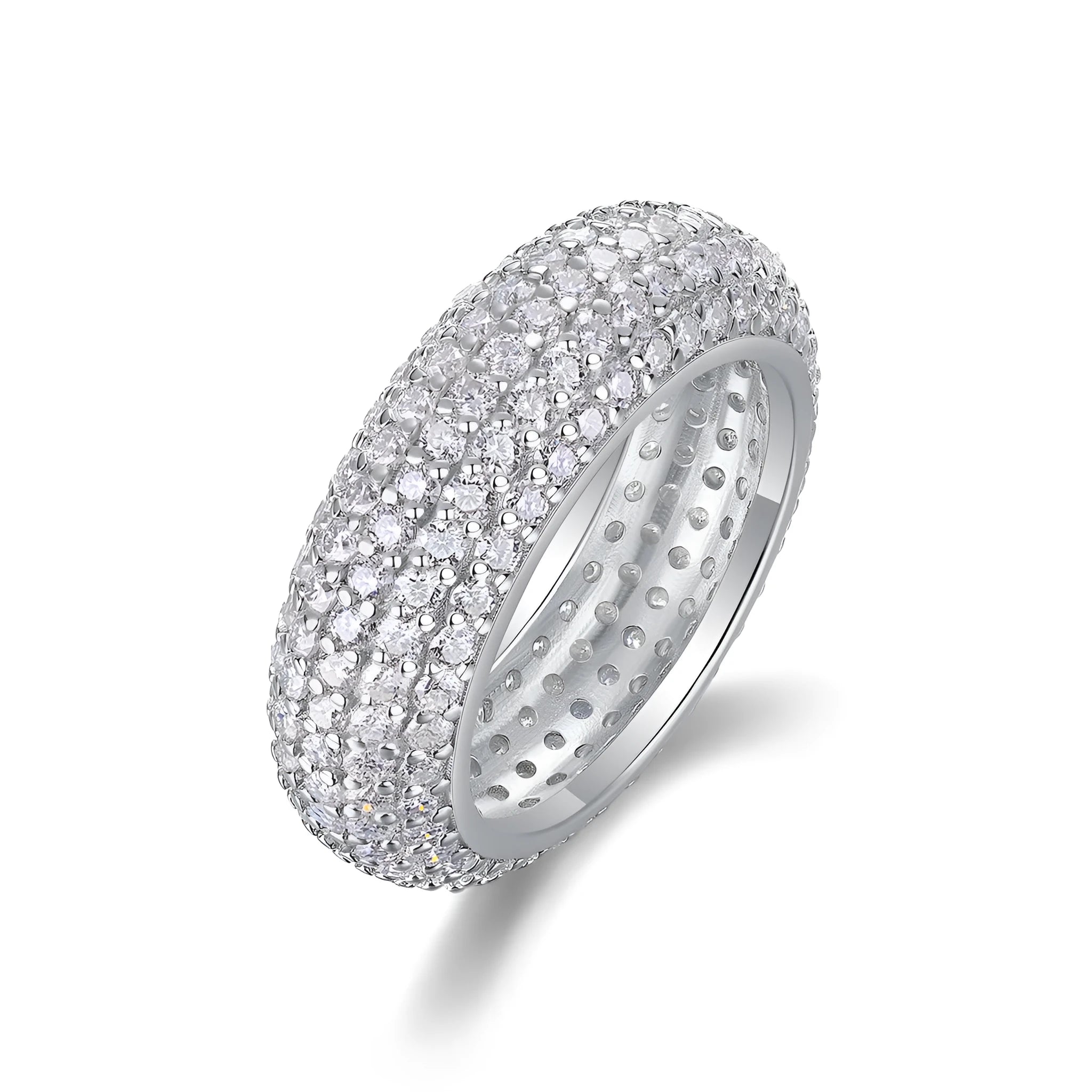 Moissanite wedding ring with S925 silver platinum plated band on flat surface showing stone and certificate