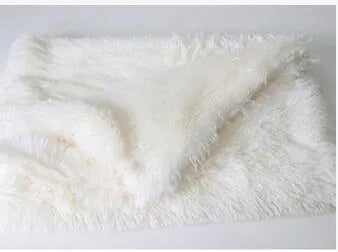 Long plush pet blanket for dogs and cats shown in light grey colour.