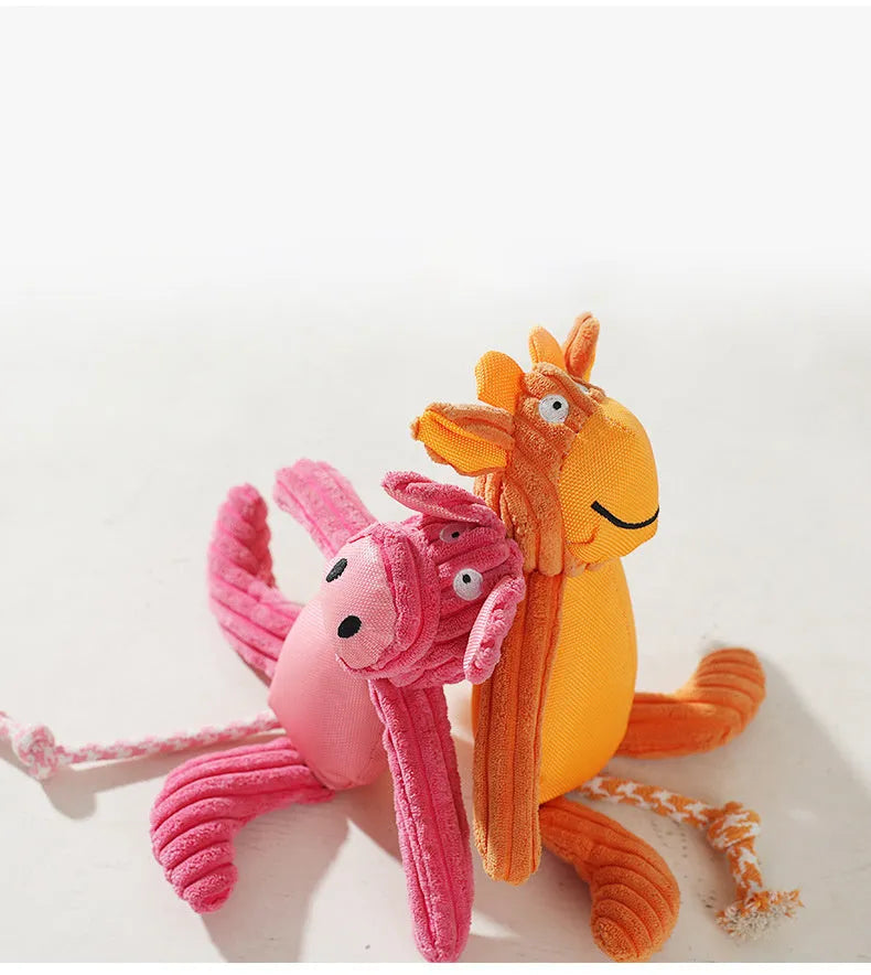Plush dog toy in cow and pig design with squeaker, 40 x 32cm, orange or pink