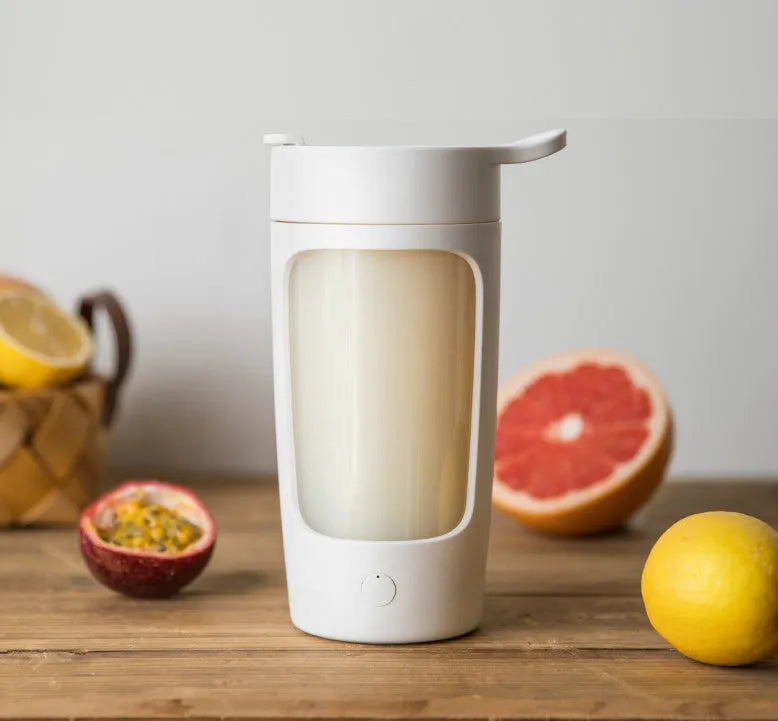 Portable automatic mixing cup in choice of colours, showing 650ml capacity and USB charging port.