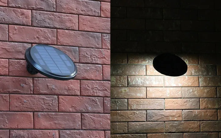 Black outdoor solar wall light with LED, IP65, for garden or pathway use