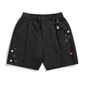 Black men's casual shorts with a semi-elastic waistband and zip fly, shown with a loose, straight-leg fit.