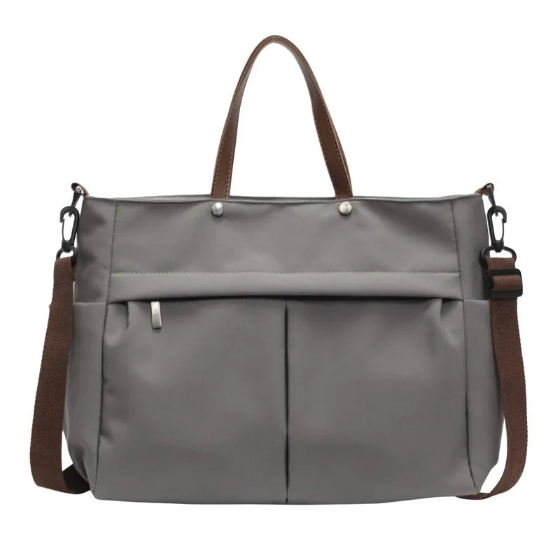 Women's nylon crossbody tote shoulder bag in black colour with measurements 39x14x28cm