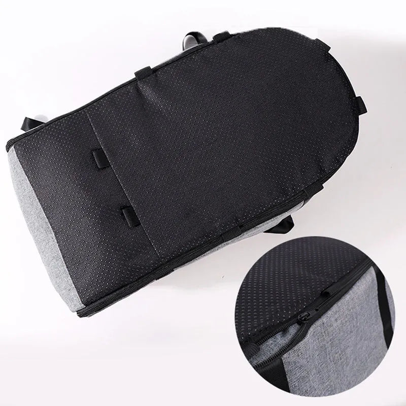 Portable grey cloth dog kennel for outdoor and car travel use.