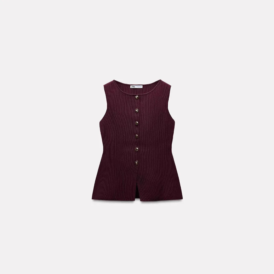 Women's dark red viscose knit sleeveless vest with gold buttons, shown on a model.