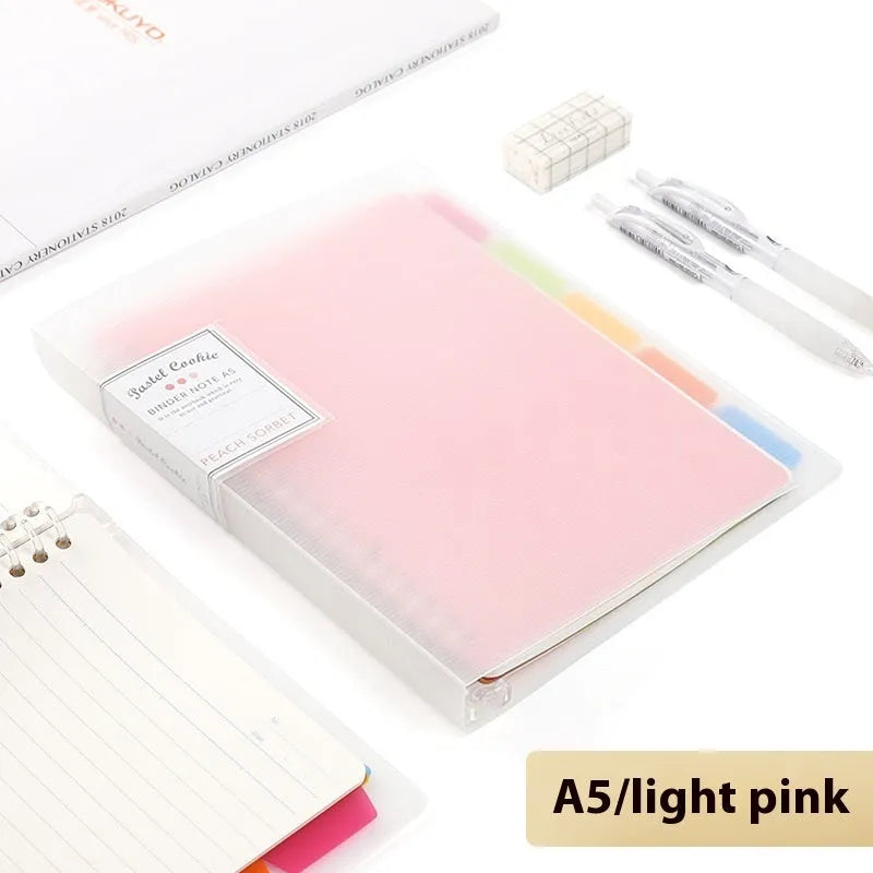 Refillable loose-leaf spiral notebook in B5 size with a pastel blue PP cover and lined pages.