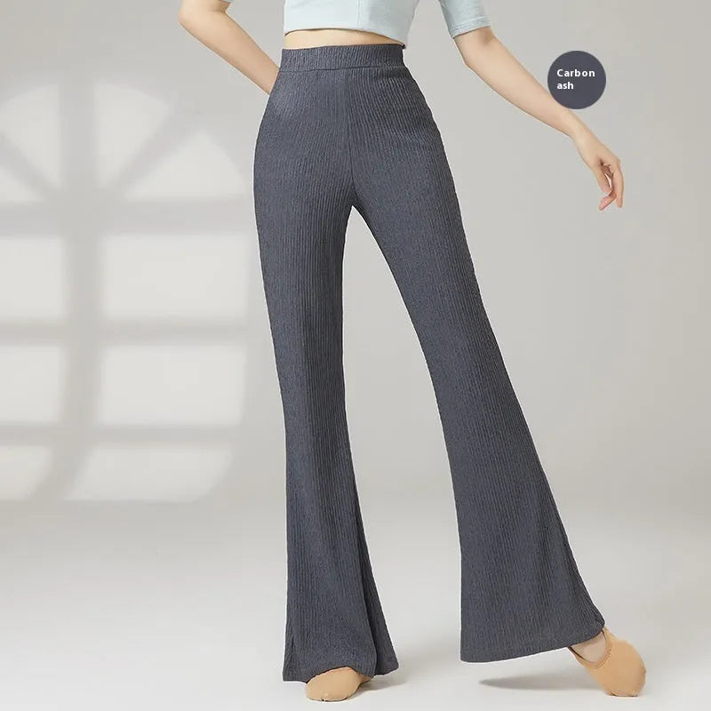 Adult female classical dance practice trousers in beige apricot, shown flat.