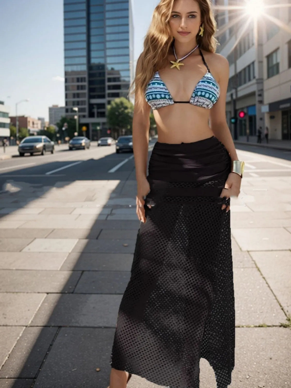 Women's brown, rose pink, and black three-piece bikini set with a long fishnet skirt.