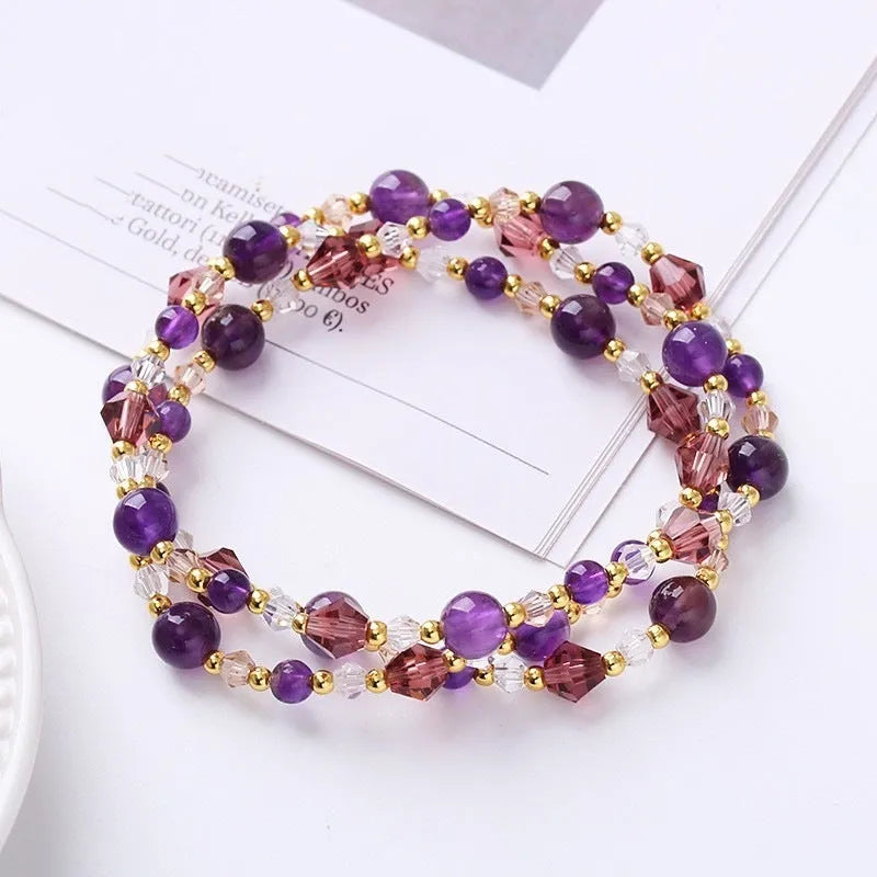 Handmade women's adjustable bracelet with three amethyst, strawberry quartz, or tourmaline crystal stones.
