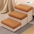 Brown foldable pet stairs steps for dogs with non-slip cloth surface on a floor