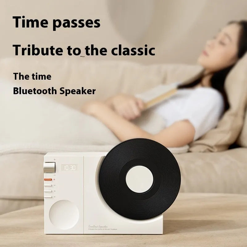 Mini portable Bluetooth speaker in Coral Pink colour with USB charging port.