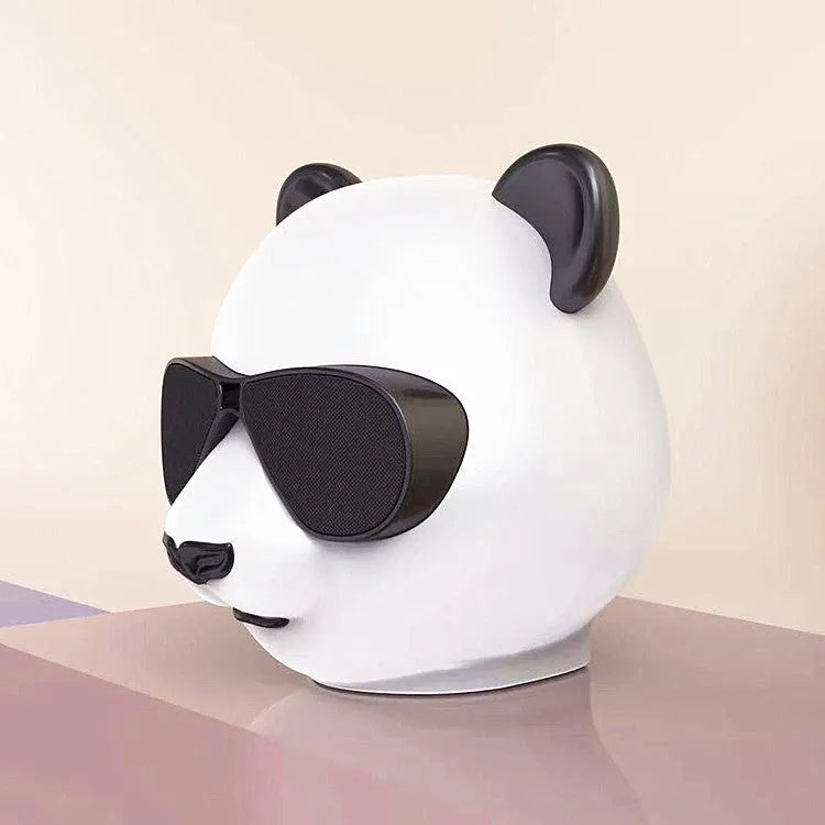 Compact classic-style portable mini Bluetooth speaker on a surface.