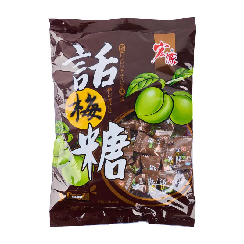 Assortment of Chinese fruit hard candies: plum sugar, guava and tangerine peel flavours in separate packets.