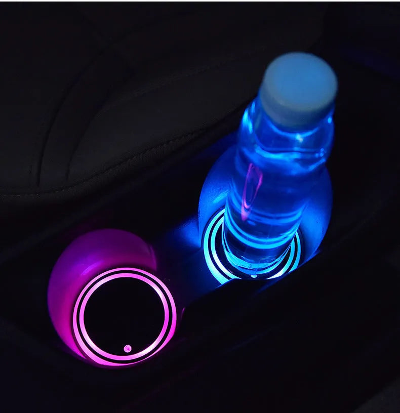 Colourful LED light-up coaster for car cup holder with non-slip surface and USB cable.