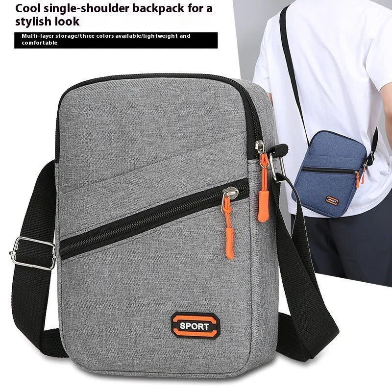 Solid colour crossbody commuter bag in Oxford cloth with ultra-light design and polyester lining