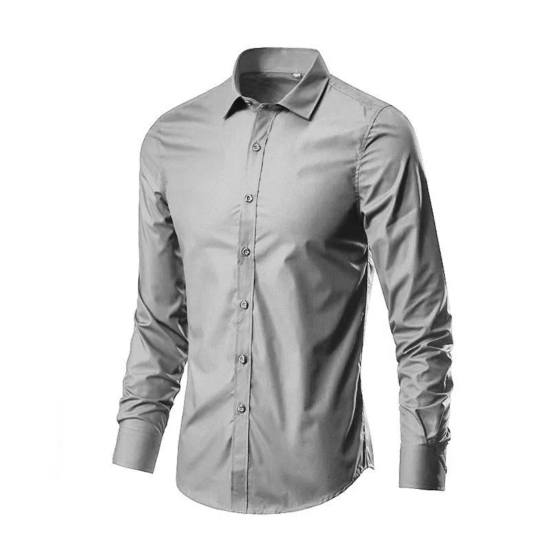 Loose fit long sleeve linen shirt on a hanger, shown in a light colour.