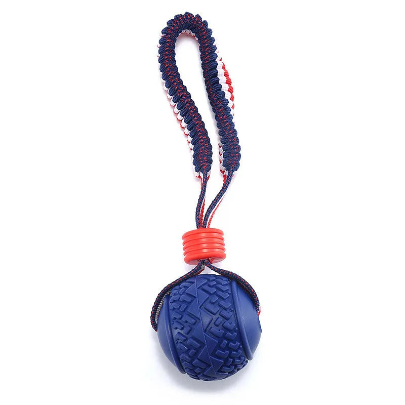 Blue natural rubber dog ball attached to a rope for tug-of-war and dental cleaning.