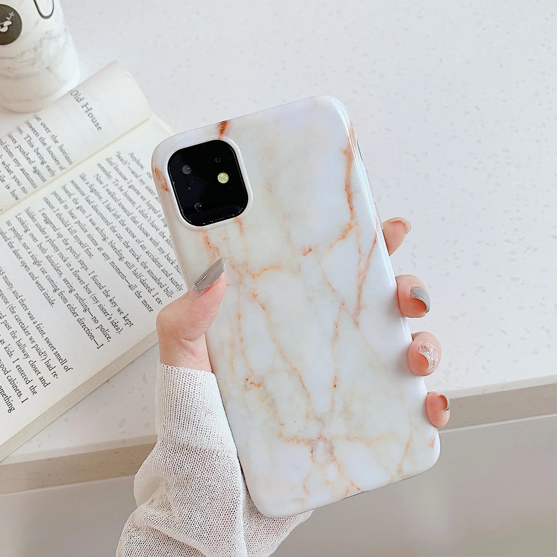 Frosty marble silicone phone case back cover with geometric pattern for iPhone models, available in multiple colours
