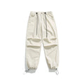 Men's loose straight-leg casual trousers in thin ice silk nylon fabric, shown in apricot colour.