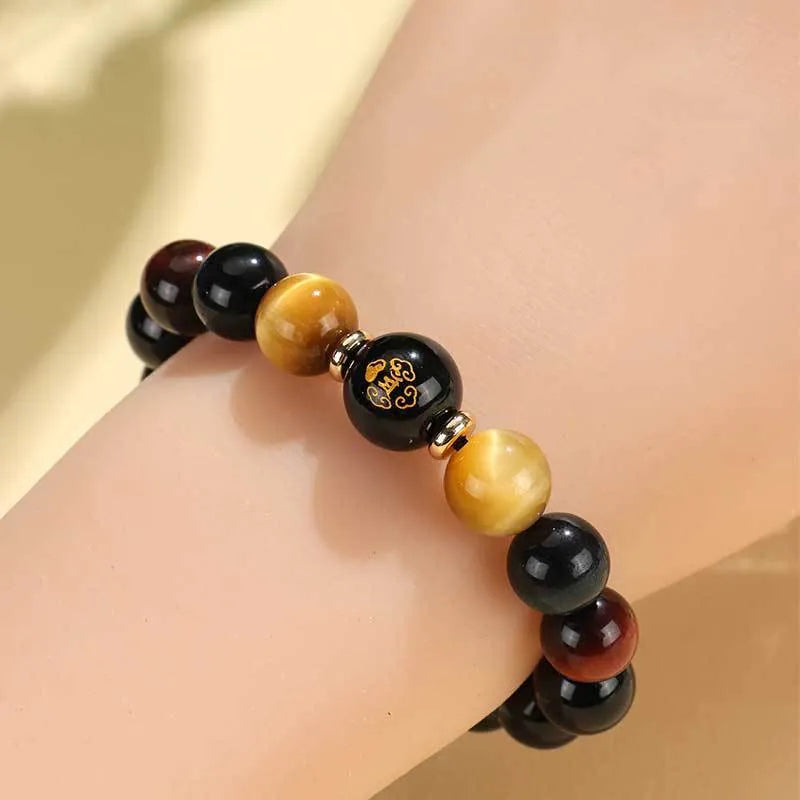 Black agate zodiac animal beaded bracelet with gold, blue and red tiger eye stones