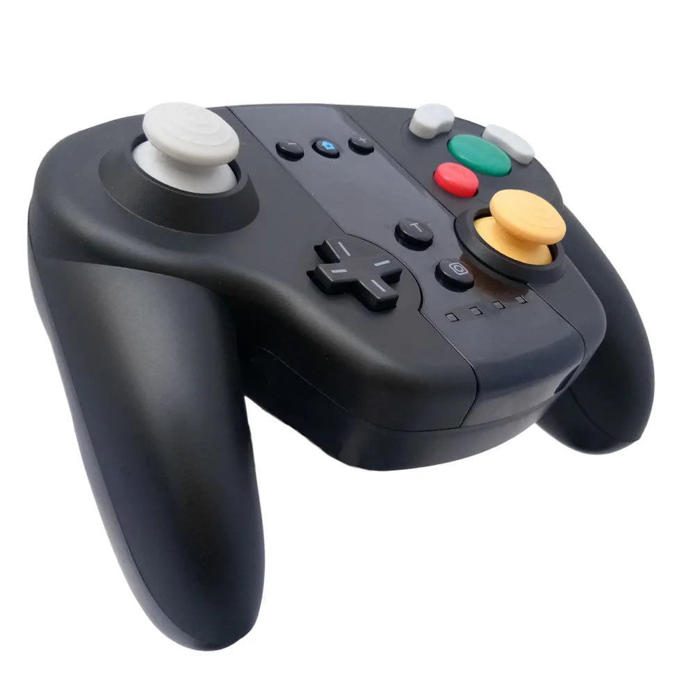 Black wireless gamepad with NFC for Nintendo Switch and PC, shown with colour packaging box.
