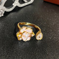 Adjustable copper ring with oil drip finish, featuring a gourd design and inlaid zircon stones.