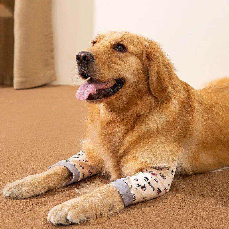 Blue dog elbow support sleeve with padded patch and matching scarf, shown with plastic buckle adjustment.