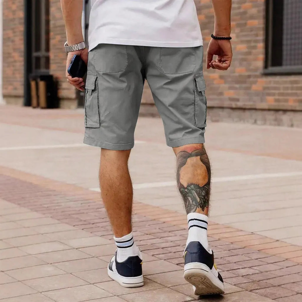 Men's loose fit straight leg cropped workwear shorts in light grey on a mannequin