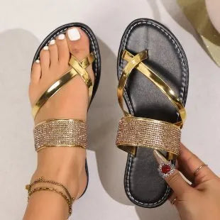 Women's black beach sandals with rhinestone toe strap and flat rubber sole