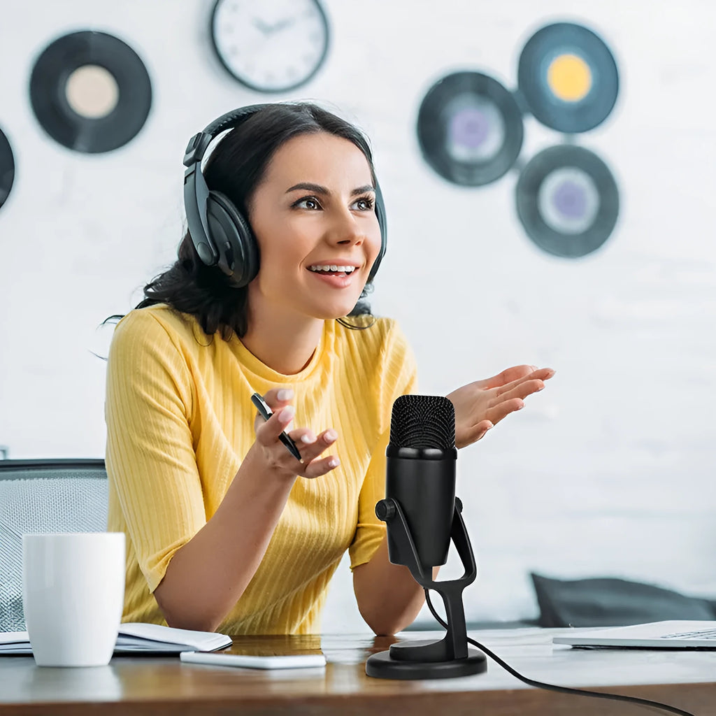 Black Boya BY-PM500 USB microphone with built-in sound card on a desk