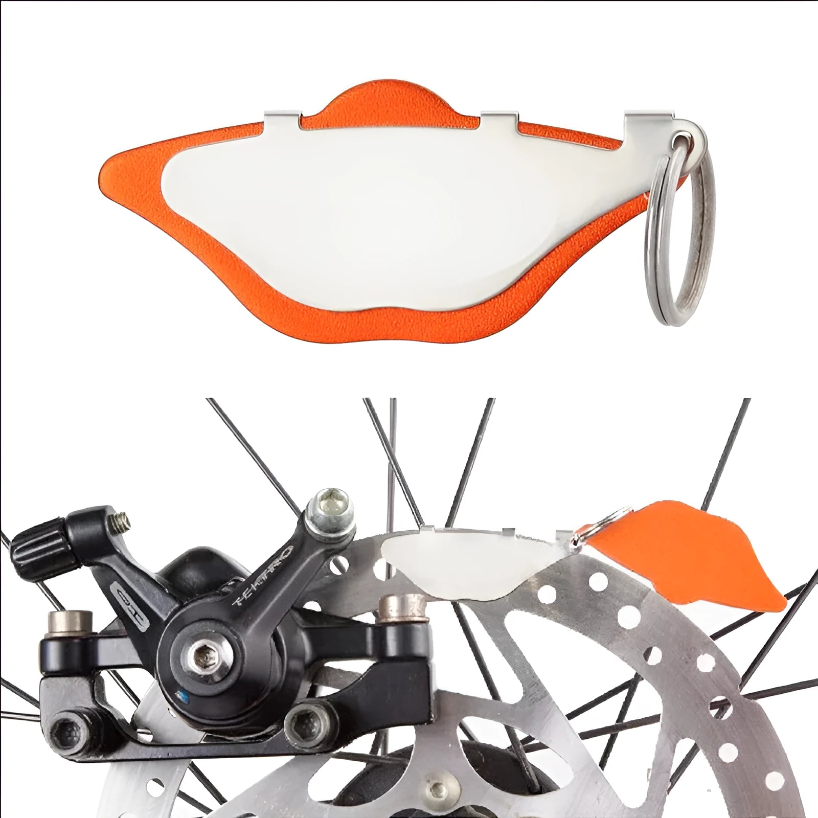 Mountain bike metal disc brake pad set in black or orange with adjustment flap