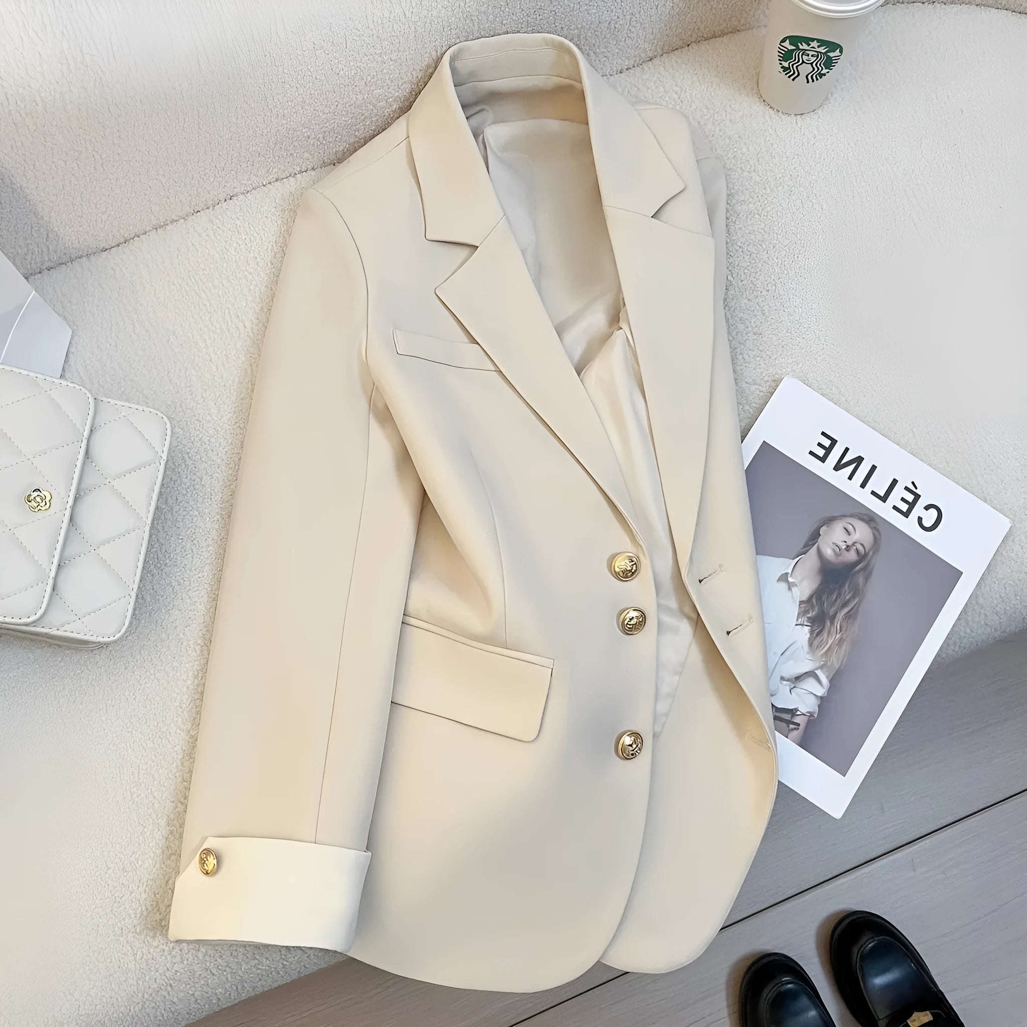 Women's loose fit Korean style coat in milky white, showing long sleeves and pockets.