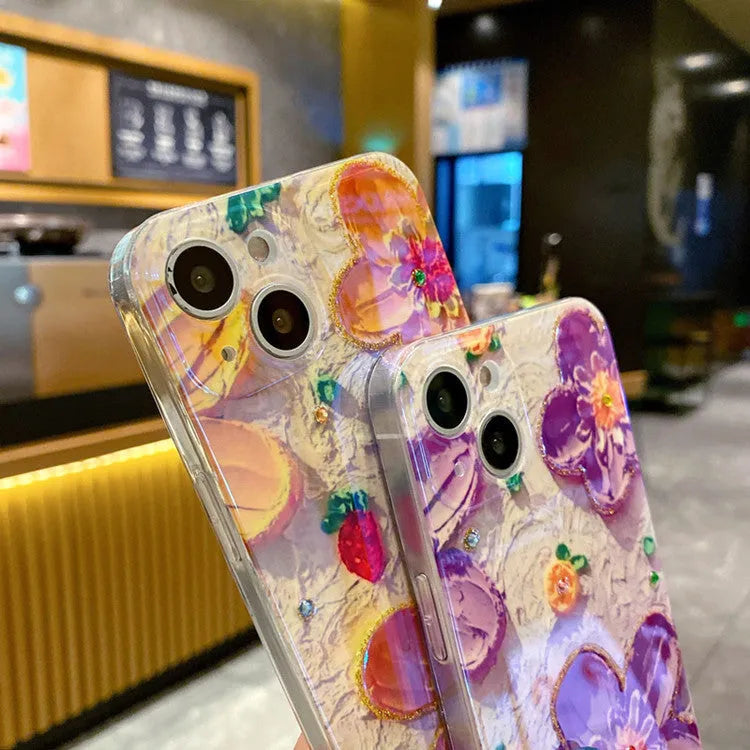 Purple and yellow soft silicone phone cases with an inlaid oil painting flower and diamond drop glue design.