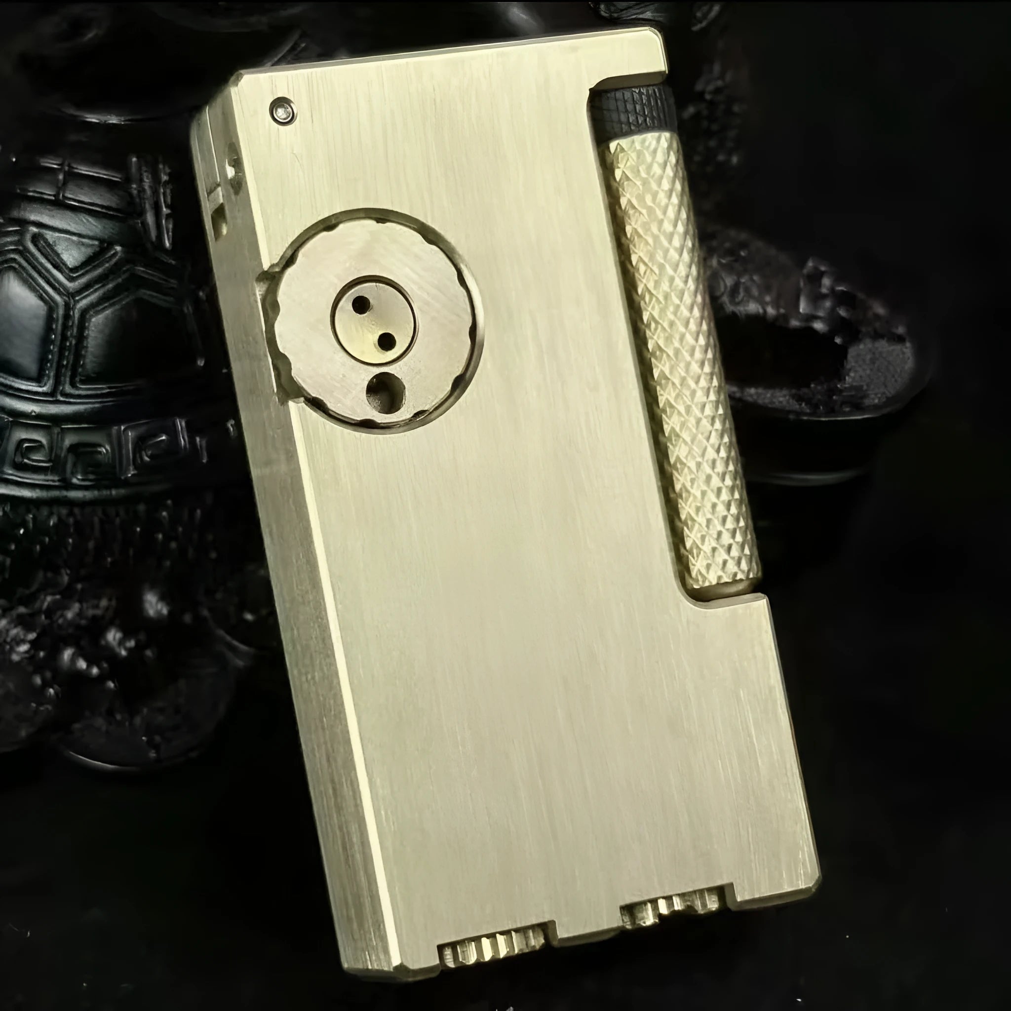 Brass metal lighter with copper flint warehouse and side sliding ignition mechanism