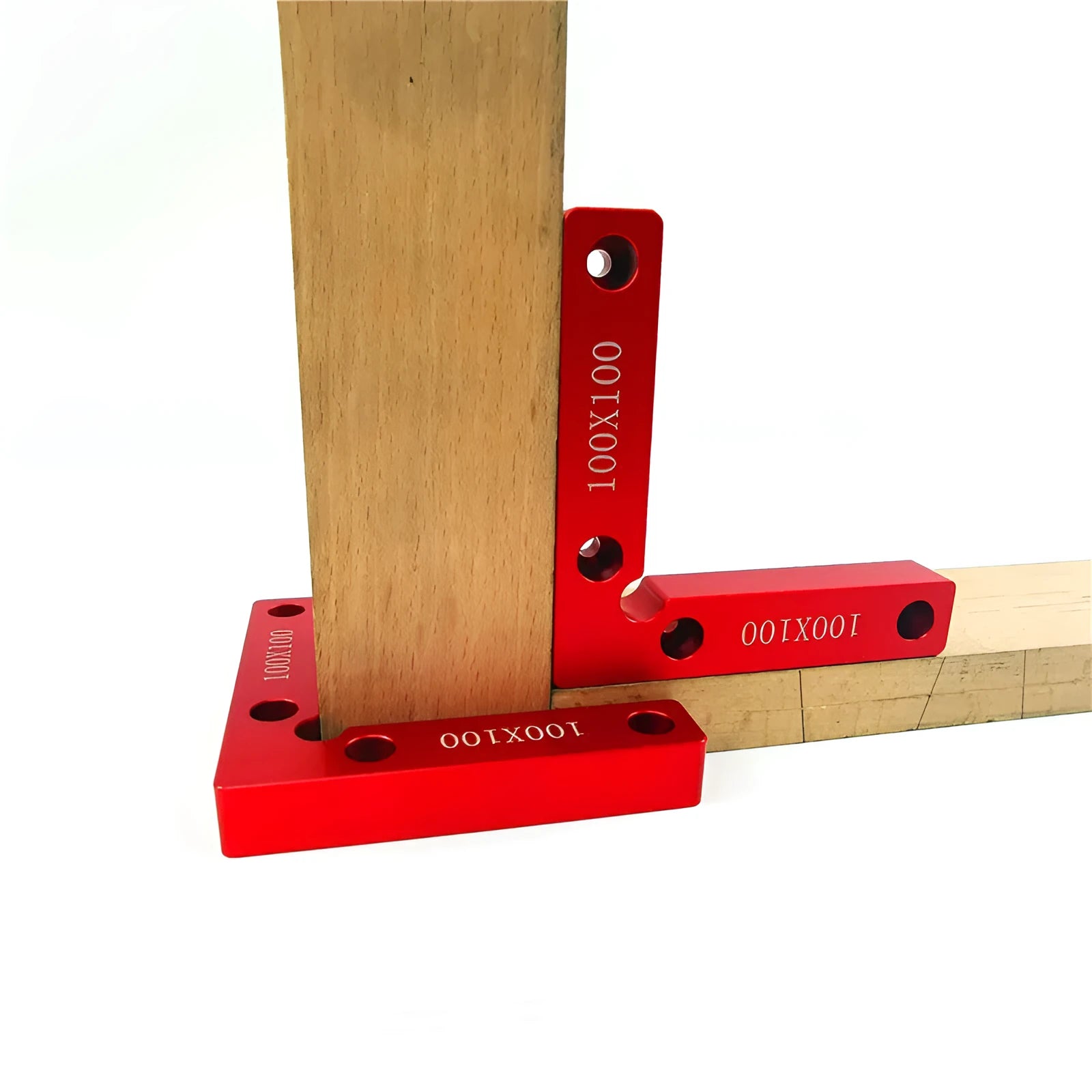 Machined aluminium right angle block with scale for woodworking jigsaw fixturing.