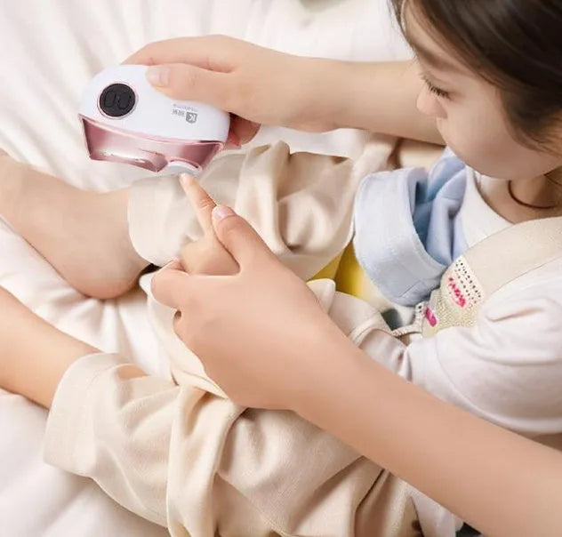 Blue electric nail clipper and polisher two-in-one tool with USB Type-C charging port and cleaning brush.