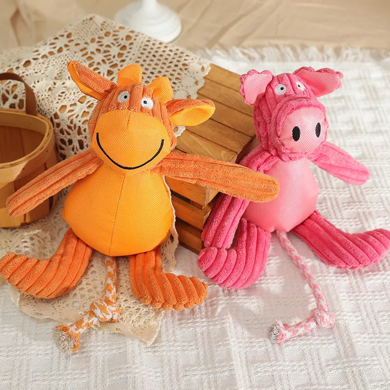 Plush dog toy in cow and pig design with squeaker, 40 x 32cm, orange or pink