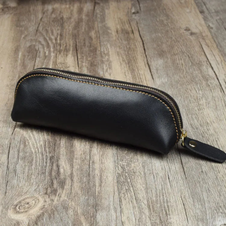 Genuine cowhide leather pencil case with zipper closure measuring 18cm long