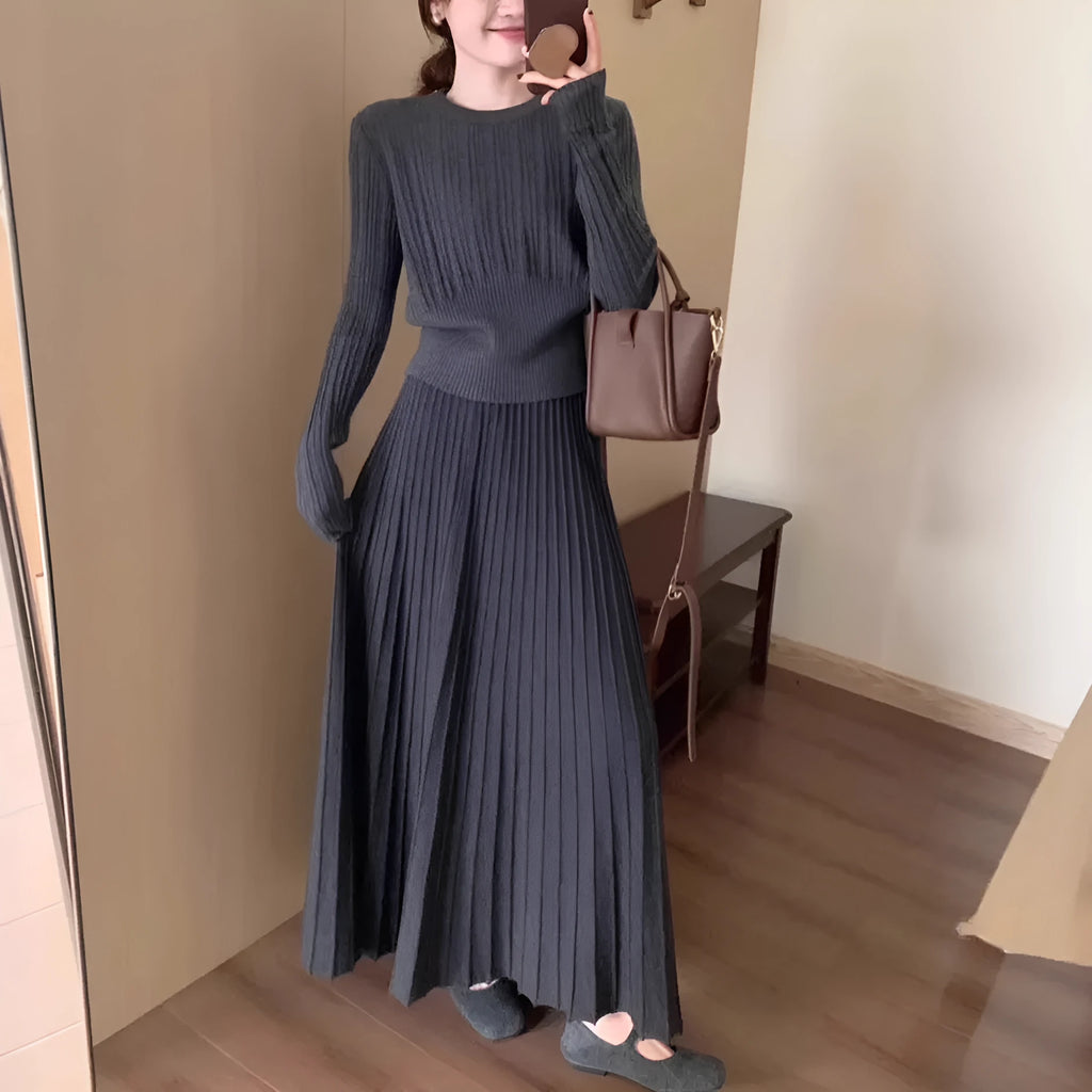 Women's dark grey knitted two-piece dress suit with 3D pattern and ethnic collage stitching.